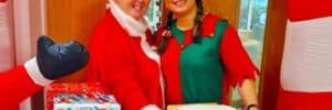 Olea Care staff dressed as santas helpers